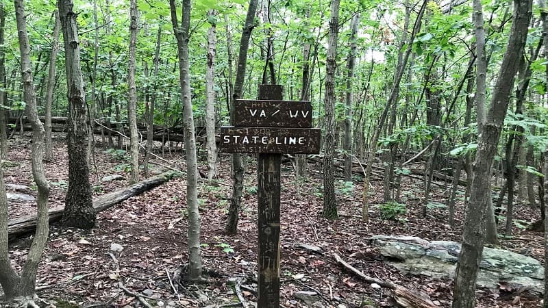 State Line Sign on Raven Rocks Hike in Bluemont, Virginia