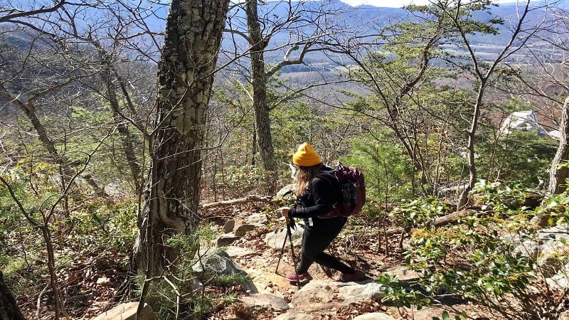 woman hiking on a trail