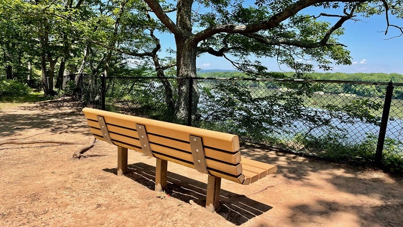 A bench at Red Rock Overlook with views of the Potomac River