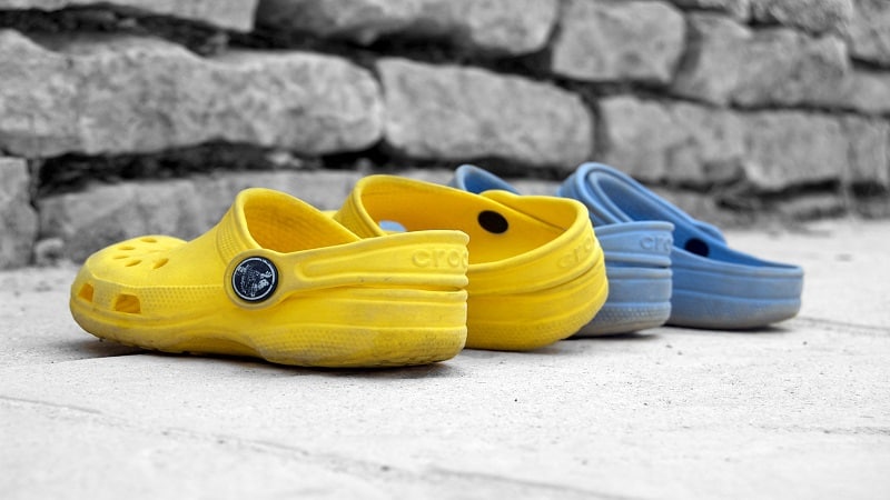 yellow and blue crocs