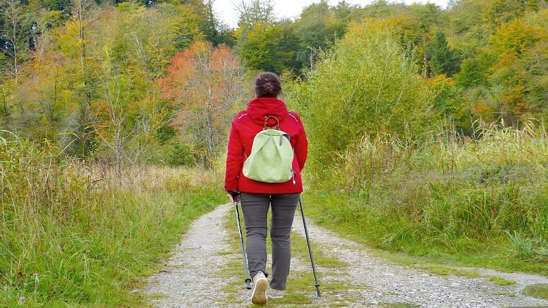 Woman Hiking in Fall with a Hiking Jacket