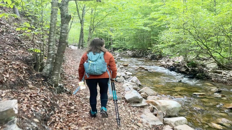 Woman Walking Next to St. Mary's River