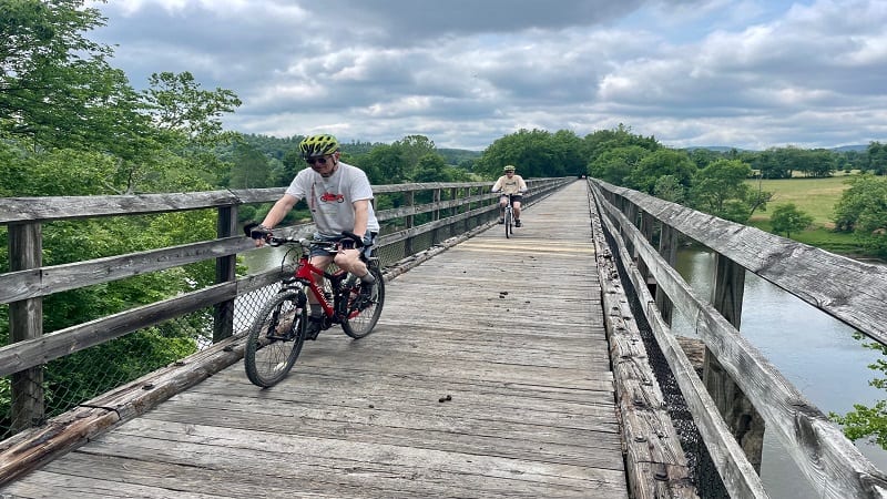 Bikers Crossing a Trestle at New River Trail State Park